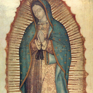 What is the message on Our Lady of Guadalupe’s mantle?