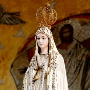 Which Marian apparition was scheduled in advance…